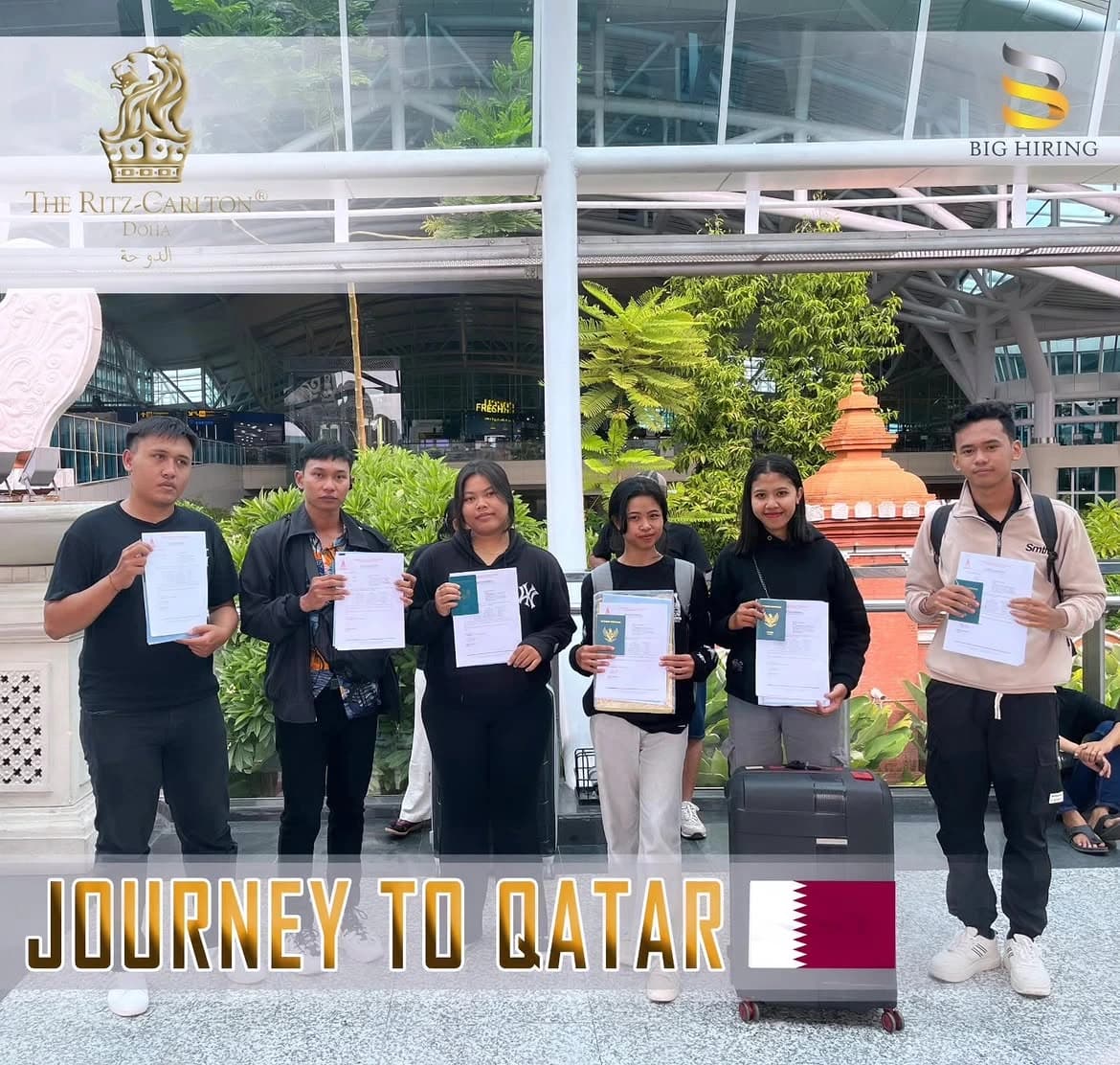 Big Hiring candidates holding placement documents before departing for Qatar